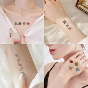 Waterproof cartoon temporary tattoos with cute rabbit and rainbow designs for skin