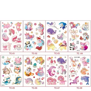 Detail view of cartoon temporary tattoos with laser holographic and gold foil effects