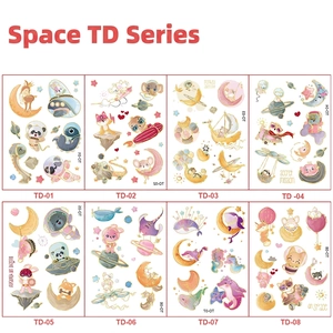 Space themed children's temporary tattoos with cute animals and holographic gold foil accents