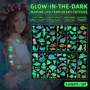 Luminous marine animal temporary tattoos for kids featuring ocean creatures and glow in the dark effect
