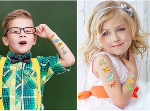 Waterproof cartoon dinosaur temporary tattoos showing vibrant colors on children's skin