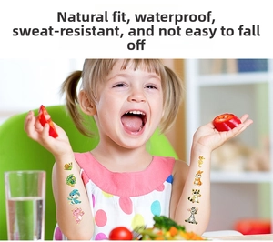 Close-up of colorful cartoon animal temporary tattoos on a smiling girl's arms