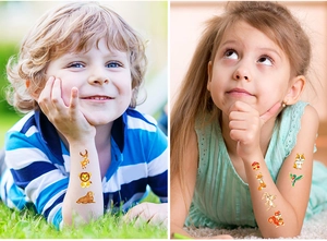 Detailed view of colorful laser gold cartoon animal temporary tattoos on children's skin