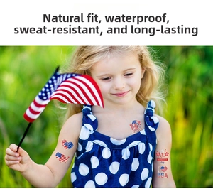 Detail showing waterproof July 4th temporary tattoos applied on a girl's arm and shoulder