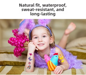 Tatouages temporaires papillon imperméables sur bras d'enfant aux motifs floraux