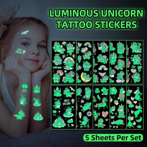 Glow-in-the-dark unicorn temporary tattoo set with rainbow and castle designs for kids
