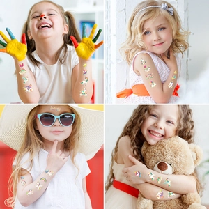 Holographic cartoon unicorn temporary tattoos for kids featuring rainbow and star designs