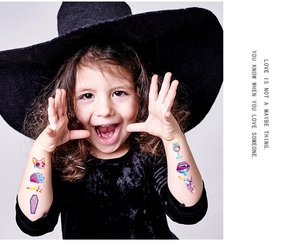 Kids halloween glitter tattoo stickers with cartoon skulls and vampires on arms
