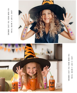 Detail of glitter Halloween temporary tattoos featuring colorful cartoon patterns for kids