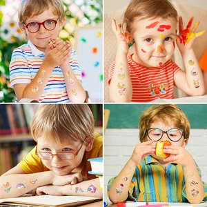 Holographic cartoon temporary tattoos for kids featuring cute space and animal motifs