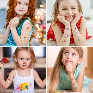 Kids temporary space tattoos featuring cartoon cats, planets and unicorns for parties