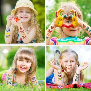 Tatouages éphémères de papillons colorés pour enfants lors d'une fête en plein air