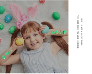 Glow-in-the-dark Easter temporary tattoos for kids featuring cute bunnies and colorful eggs