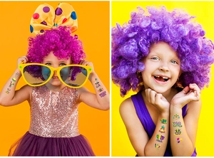 Detail of colorful Mardi Gras carnival temporary tattoo stickers on a child skin