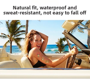 Waterproof Hawaiian tattoo sticker showing tropical mask and sun patterns on arm