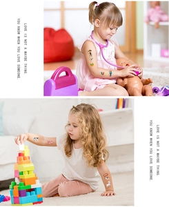 Girl playing with farm animal temporary tattoos featuring cows and sheep on her arm