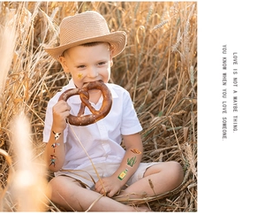 Detail of waterproof cowboy temporary tattoos for kids with cactus and star patterns