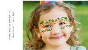 Close-up of St. Patrick's Day temporary facial tattoos featuring green clovers and hats