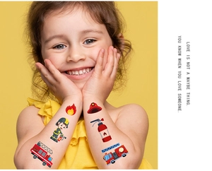 Vivid waterproof cartoon fire truck temporary tattoo stickers applied on a child's arm