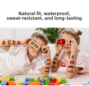 Children wearing waterproof cartoon train stickers while playing with blocks on a rug