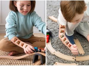 Detailed view of children using colorful train-themed waterproof temporary tattoo stickers