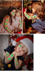 Luminous Christmas tattoo stickers for kids featuring glowing Santa and reindeer designs