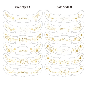 Detail of metallic gold Halloween face tattoos with spider web and pumpkin motifs