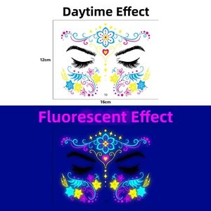Macro view of 16x12cm neon butterfly face tattoos showing day vs glow in the dark effect