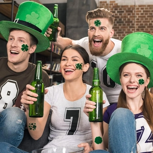 St. Patrick's Day party set with shamrock temporary tattoos and green Irish festival hats