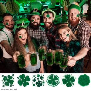 Group photo of friends using green shamrock face tattoos for St. Patrick's Day celebration