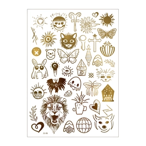 Metallic gold temporary tattoo sheet featuring lion and mystical celestial sun designs