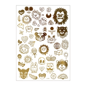 Detail of metallic gold tattoo sheets with lion, sun totem and heart patterns