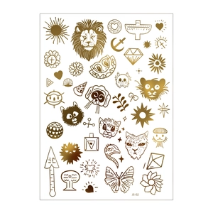 Detailed sheet of golden metallic temporary tattoos with lions, cats and boho sun patterns