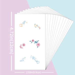 Mini ear tattoo sticker set with floral, butterfly, and jellyfish designs, 12x6.8cm size