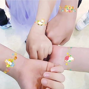 Kids Easter wrist tattoo stickers featuring cute cartoon rabbits and sheep on arms