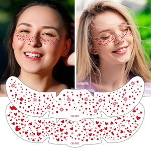 Metallic red temporary face tattoos featuring star and heart freckle patterns for parties