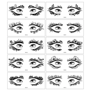 Detail of ten black butterfly and floral temporary eye tattoo stickers for party makeup