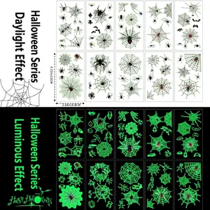 Luminous spider web temporary tattoos for Halloween, featuring green glow-in-the-dark effect