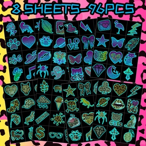 Detailed set of 96 green luminous leopard temporary tattoos with neon animal patterns