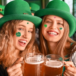 Glitter St. Patrick's Day temporary face tattoos featuring green shamrock and heart designs