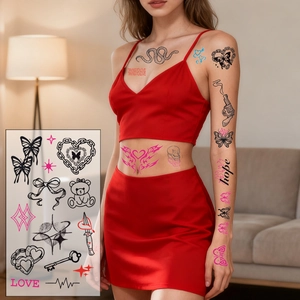 Y2K punk style temporary tattoos with pink hearts and black butterfly bow designs