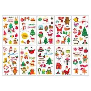 Set of 10 colorful cartoon Christmas temporary tattoos featuring Santa, reindeer and snowmen