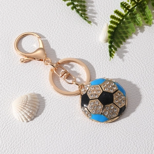 Sparkling blue and black rhinestone football keychain with gold-tone alloy lobster clasp