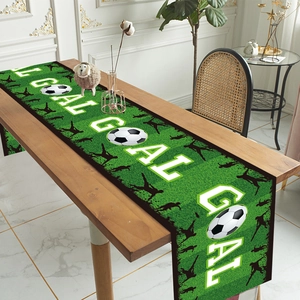 Soccer goal theme table runner with green grass field design and goal text print