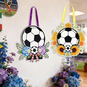 Detail of soccer themed wooden hanging signs with ribbons, sunflowers and floral accents