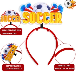 Red soccer themed headband with yellow soccer text and detachable trumpet decorations