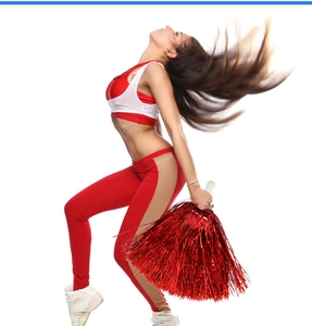 Close-up of vibrant red metallic cheerleader pom pom with a white ergonomic handle