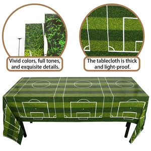 Close-up of green soccer field tablecloth showing pitch lines and thick waterproof PE material
