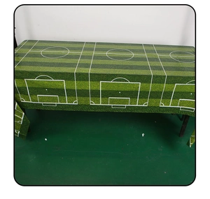 Detail of green soccer field pattern table cover for World Cup themed football parties