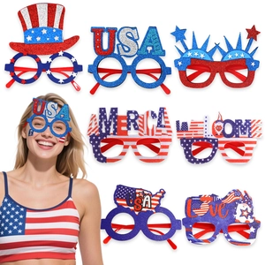 Close-up of USA themed party glasses with red white and blue glitter and flag patterns